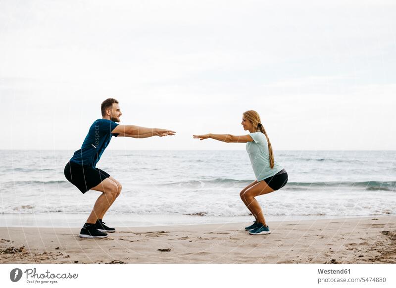 Young couple during training on the beach human human being human beings humans person persons caucasian appearance caucasian ethnicity european 2 2 people