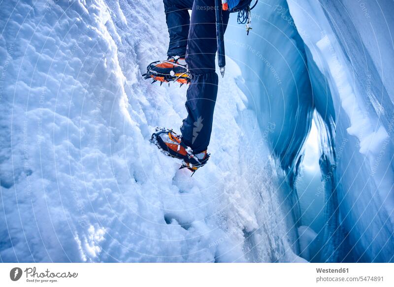 Mountaineer climbing in crevasse, Glacier Grossvendediger, Tyrol, Austria human human being human beings humans person persons caucasian appearance