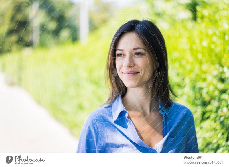 Portrait of a beautiful woman in nature mature woman mature women portrait portraits smiling smile females Adults grown-ups grownups adult people persons