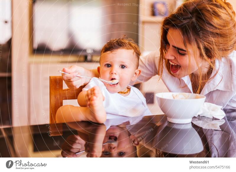 Mother feeding her little son human human being human beings humans person persons caucasian appearance caucasian ethnicity european 2 2 people 2 persons two