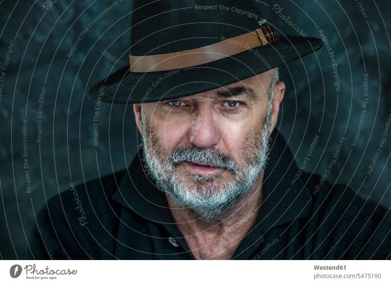 Portrait of senior man with hat human human being human beings humans person persons machos hats smile Contented Emotion pleased grey Distinct individual