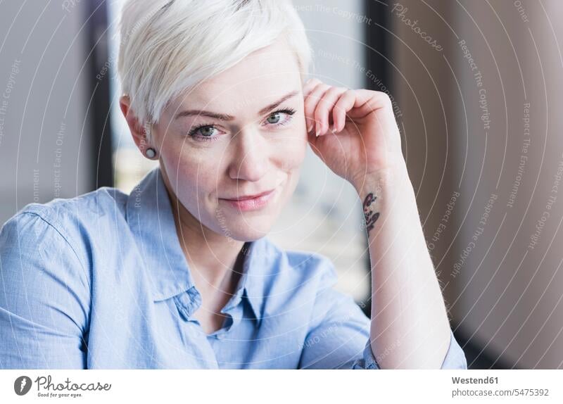 Portrait of smiling blond woman portrait portraits females women smile confidence confident Adults grown-ups grownups adult people persons human being humans