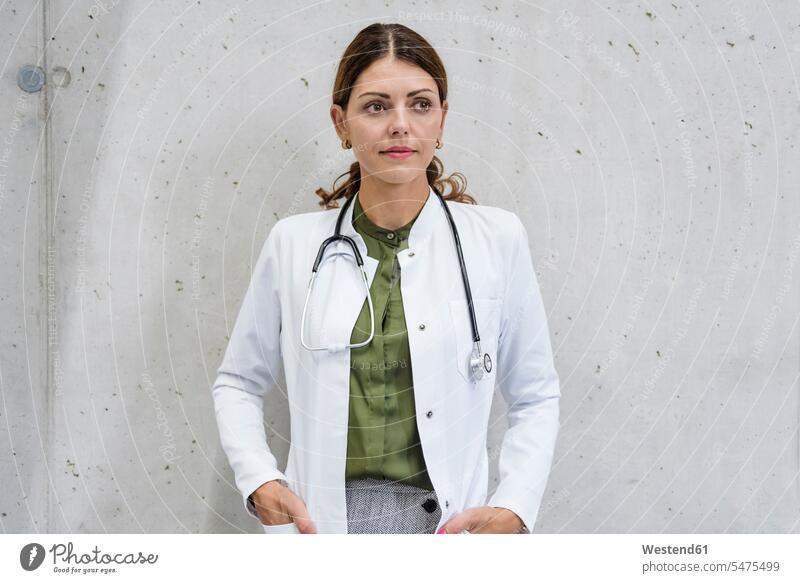 Portrait of a female doctor with stethoscope portrait portraits Female Doctor physicians Female Doctors healthcare and medicine medical Healthcare And Medicines