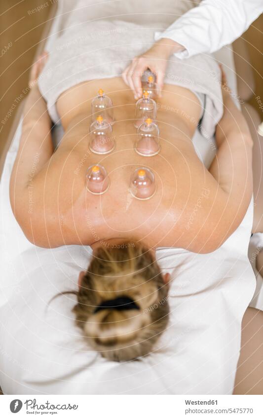 Cupping therapy, treatment at back health healthcare Healthcare And Medicines medical medicine disease diseases ill illnesses sick Sickness patients Occupation