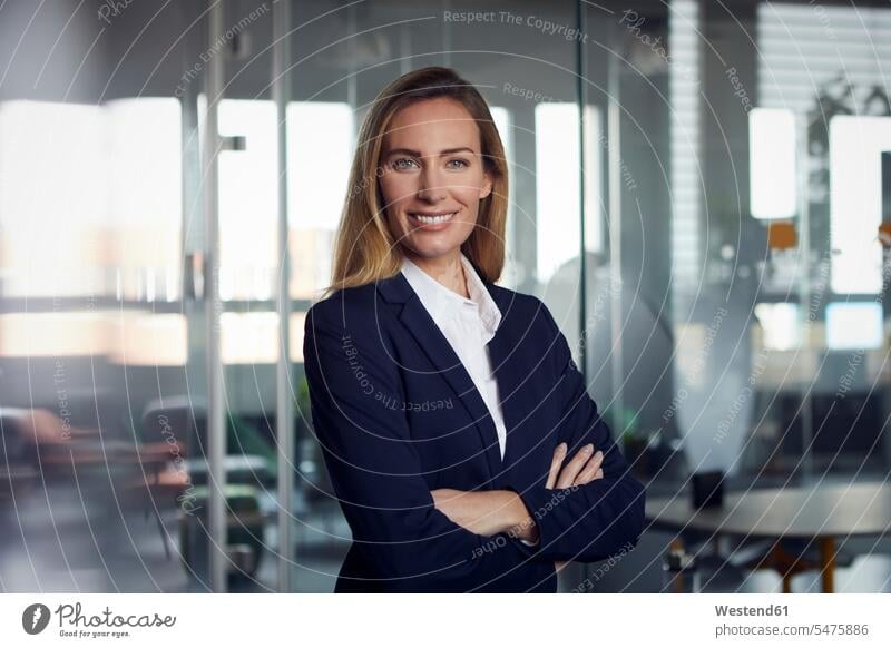 Portrait of smiling businesswoman in office Occupation Work job jobs profession professional occupation business life business world business person