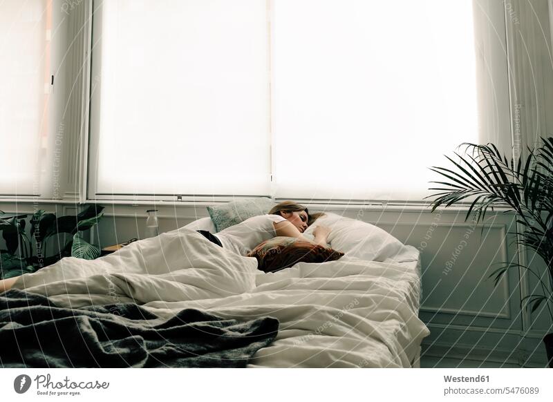 Woman sleeping in bed human human being human beings humans person persons caucasian appearance caucasian ethnicity european 1 one person only only one person