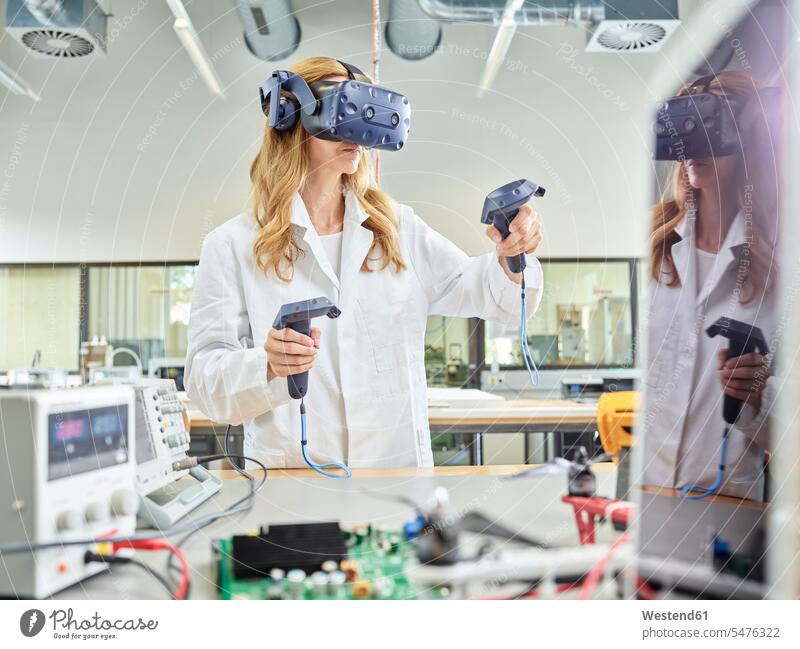 Female technician working with 3D glasses occupation profession professional occupation jobs engineer female engineer engineers female engineers At Work