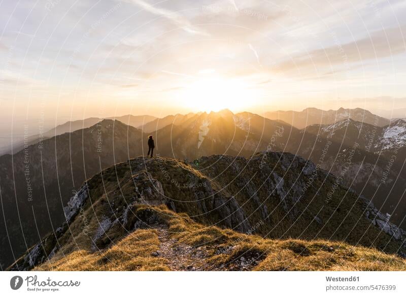 Female hiker during sunset, Saeuling, Bavaria, Germany human human being human beings humans person persons caucasian appearance caucasian ethnicity european 1