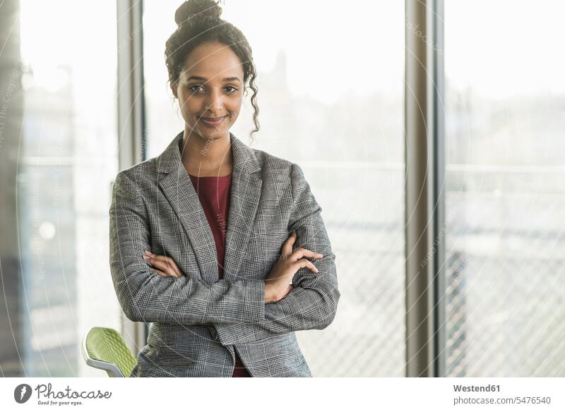 Portrait of a confident young businesswoman in office Occupation Work job jobs profession professional occupation human human being human beings humans person