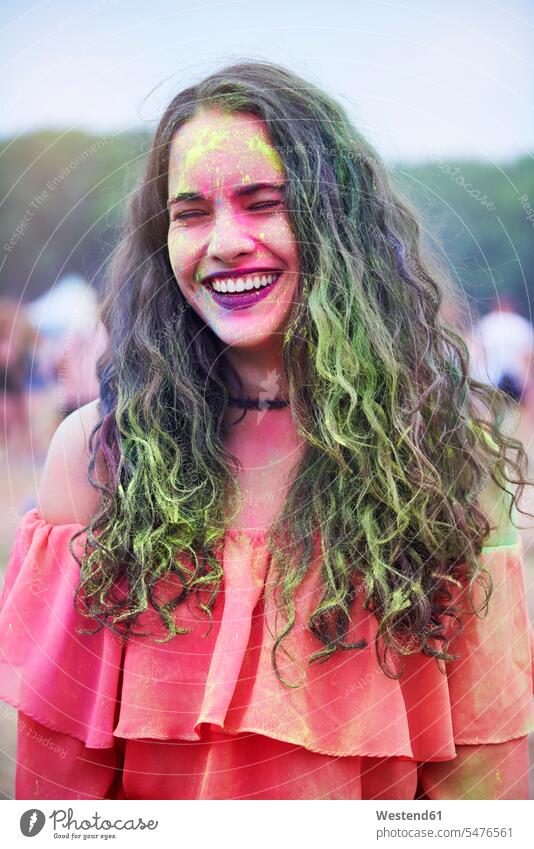 Portrait of young woman with colour powder at music festival color powder colored powder Powder Color coloured powder powders portrait portraits females women