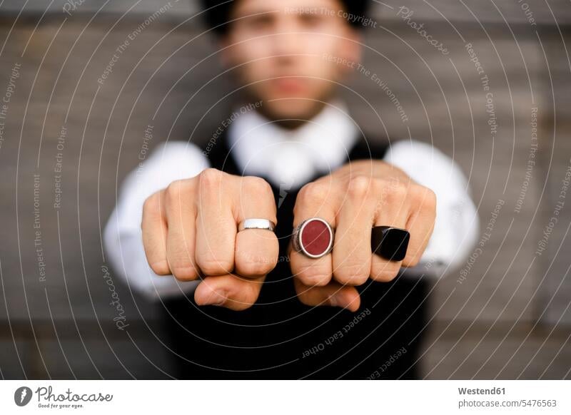 Man's hands with three various rings, close-up jewelry colour colours Distinct individual Lifestyle fashionable location shot location shots outdoor