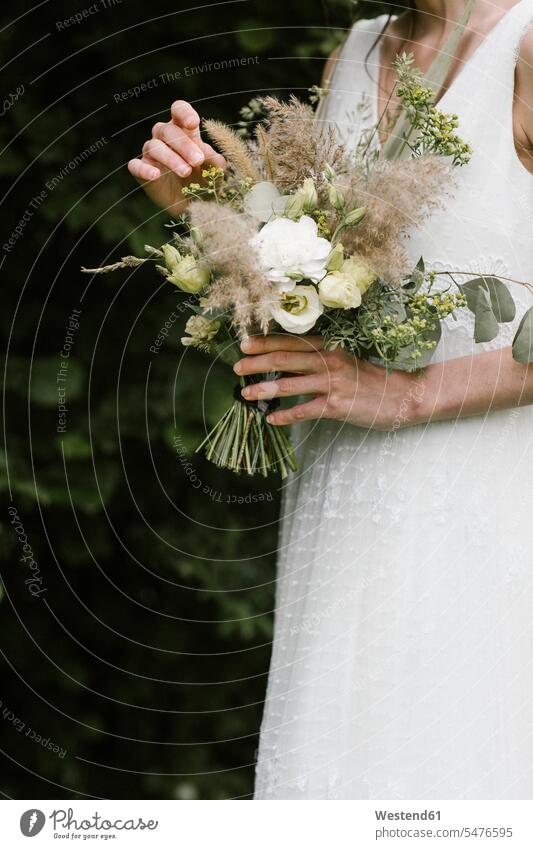 Young woman in elegant wedding dress holding bouquet cutout cutouts cut out series studio shot indoor indoors interior shot interiour shots interiour photo