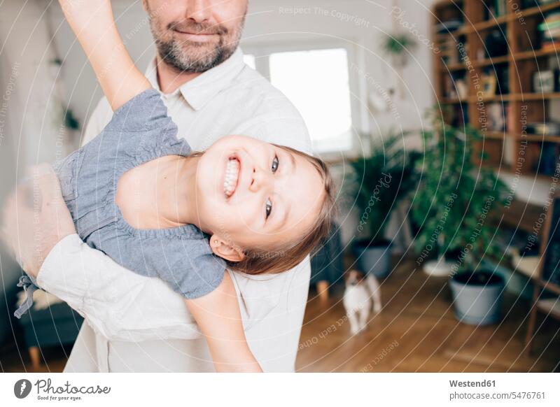 Father playing with daughter, pretending to fly human human being human beings humans person persons caucasian appearance caucasian ethnicity european 2