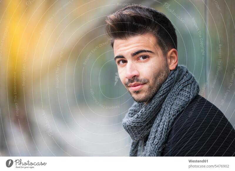 Handsome young man with scarf around neck color image colour image day daylight shot daylight shots day shots daytime 18-19 years 18 to 19 years Millennials