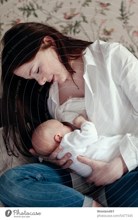 Woman breastfeeding her baby son Cutie twee human human being human beings humans person persons caucasian appearance caucasian ethnicity european 2 2 people