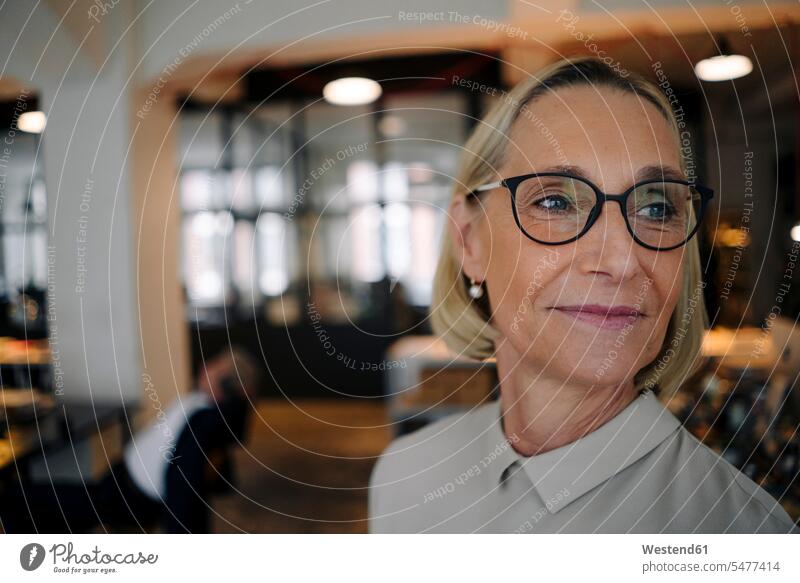 Portrait of confident mature businesswoman in office Occupation Work job jobs profession professional occupation business life business world business person