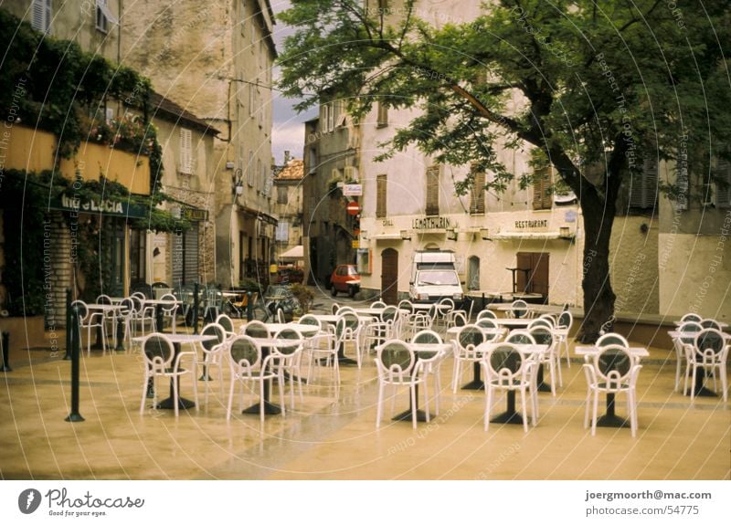 Village square in Corsica Vacation & Travel Table Chair House (Residential Structure) Town Tree Places Dusk coffee Rain Weather Downtown