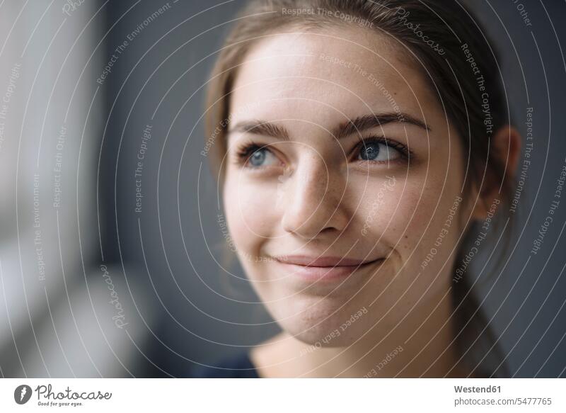 Portrait of smiling young woman looking at distance human human being human beings humans person persons caucasian appearance caucasian ethnicity european 1