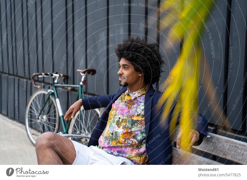Stylish man with bicycle sitting on a bench business life business world business person businesspeople Business man Business men Businessmen shirts benches