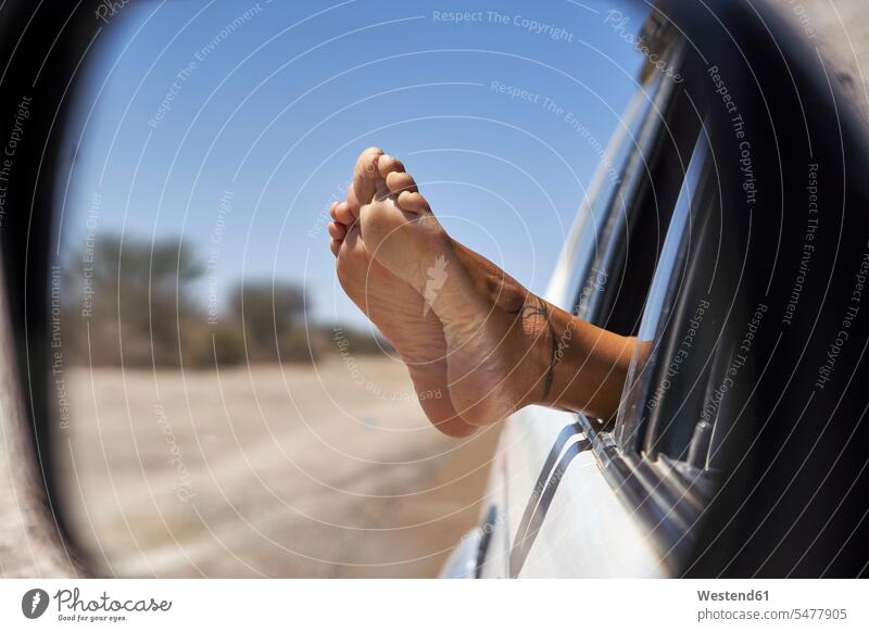Woman's feet leaning out of the car window human human being human beings humans person persons caucasian appearance caucasian ethnicity european 1
