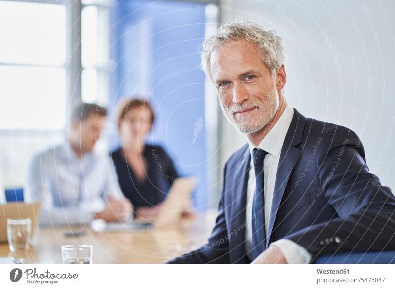 Portrait of confident manager during a meeting in office colleague Occupation Work job jobs profession professional occupation superior supervisor the boss