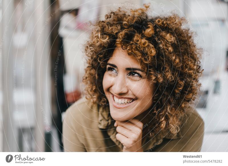Portrait of a laughing pretty woman Laughter happiness happy females women attractive beautiful good-looking Attractiveness Handsome portrait portraits positive