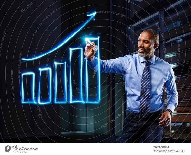 Businessman painting upturning bar chart with light Business man Businessmen Business men charts lights Shirt and Tie graph Graphs Bar Chart bar graph