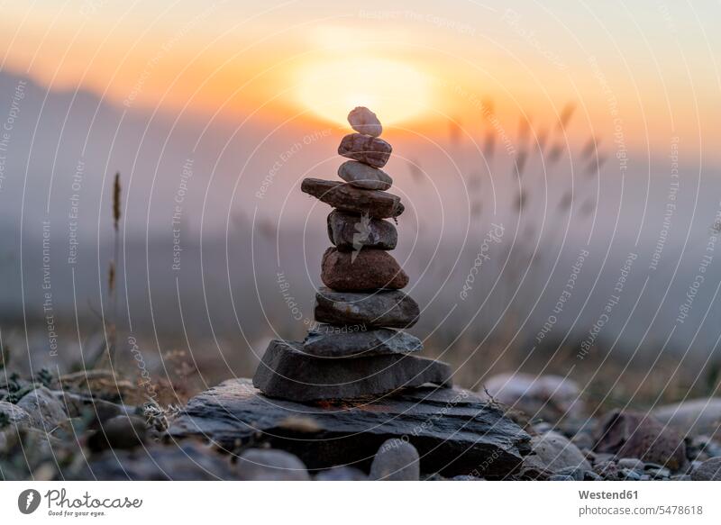 Cairn at sunset evening in the evening focus on foreground Focus In The Foreground focus on the foreground copy space Surface Level worm's eye view Spirituality