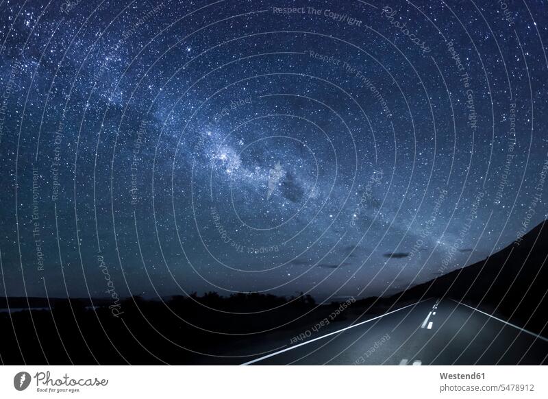 New Zealand, South Island, starry sky, milkyway at Lake Pukaki by night the way forward outdoors location shot outdoor shots location shots Empty Road Milky Way