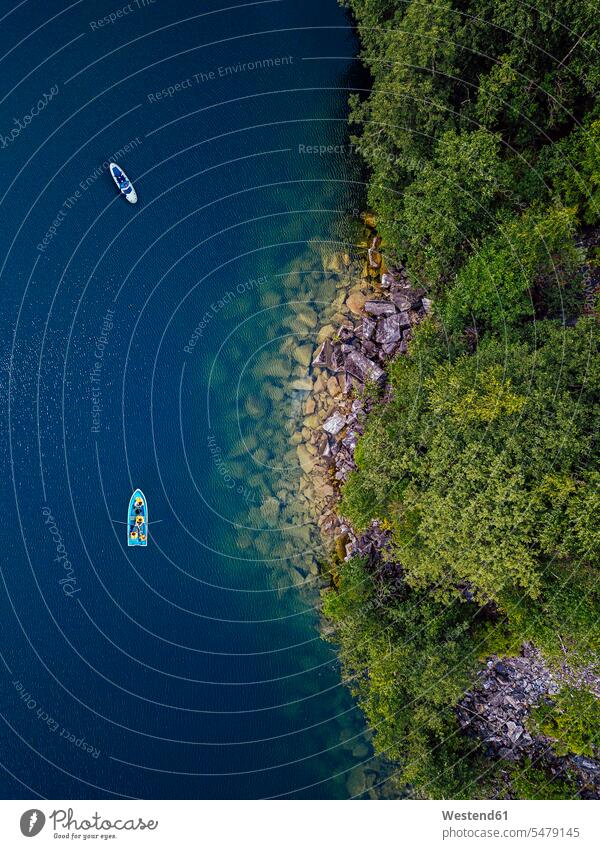 Aerial view of boat at rocky shore of Lake Light outdoors location shots outdoor shot outdoor shots day daylight shot daylight shots day shots daytime