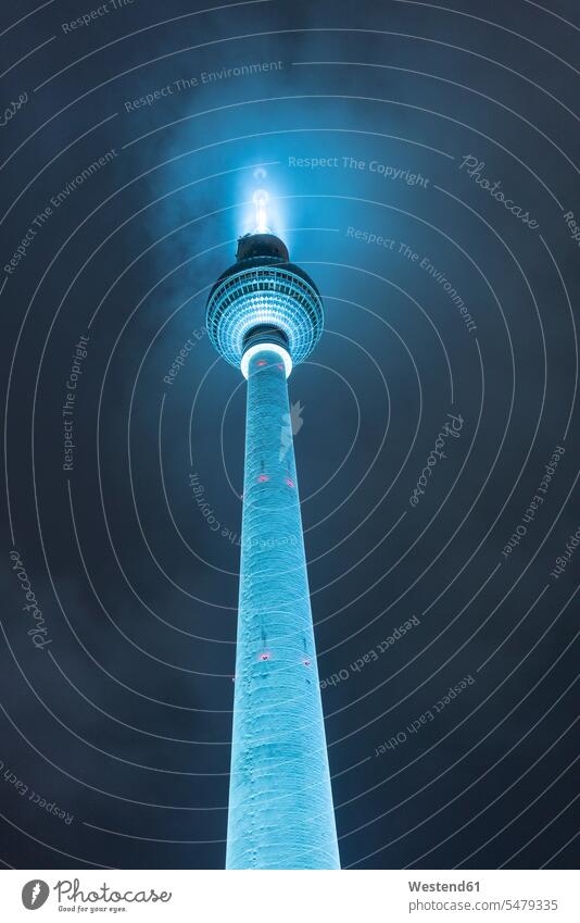 Germany, Berlin, illuminated television tower at night shining shine illumination illuminations Sightseeing light blue urban scene cloudy cloudiness clouds