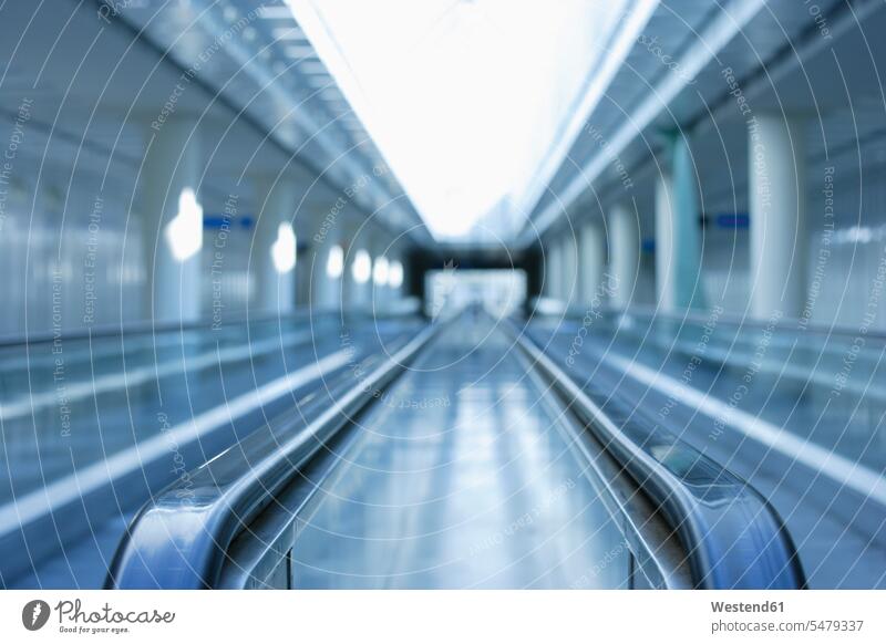 Europe, Germany, Bavaria, Escalator at Munich airport conveyor belt focus on foreground blurred focus on the foreground Absence Absent convenience convenient