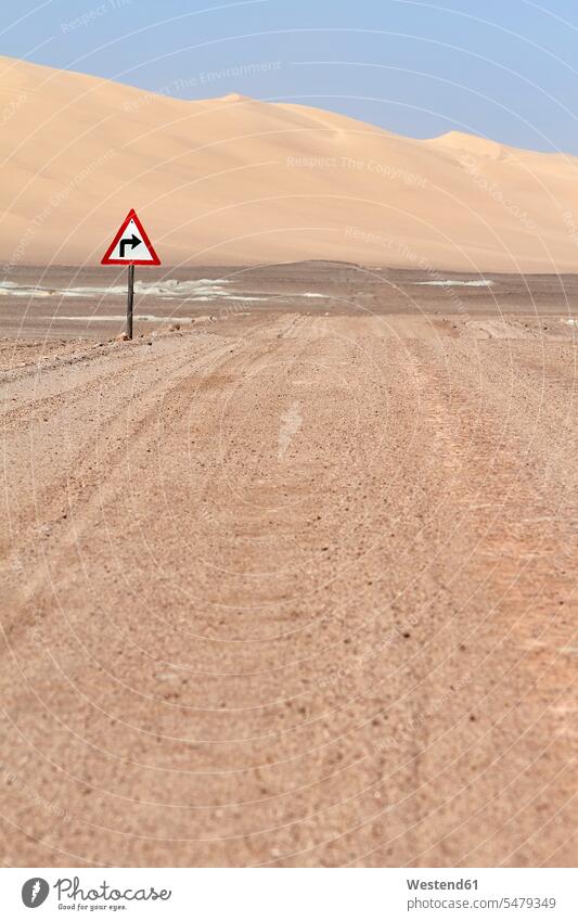 Namibia, Directional road sign in middle of desert outdoors location shots outdoor shot outdoor shots day daylight shot daylight shots day shots daytime