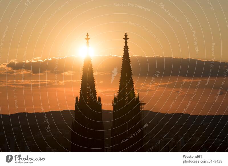 Germany, Cologne, silhouettes of spires of Cologne Cathedral at sunset high-contrast Contrasty High Contrast urban scene Architecture evening sun setting sun