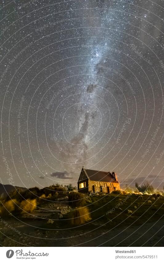New Zealand, Oceania, South Island, Lake Tekapo, Church of the Good Shepherd and Milky Way on sky at night outdoors location shots outdoor shot outdoor shots