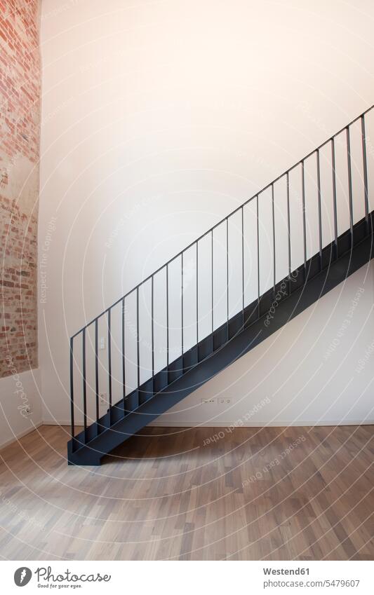 New staircase in a loft formerly factory immovables property emptiness text space Railings bannister stairway refurbishing restoration restore floors