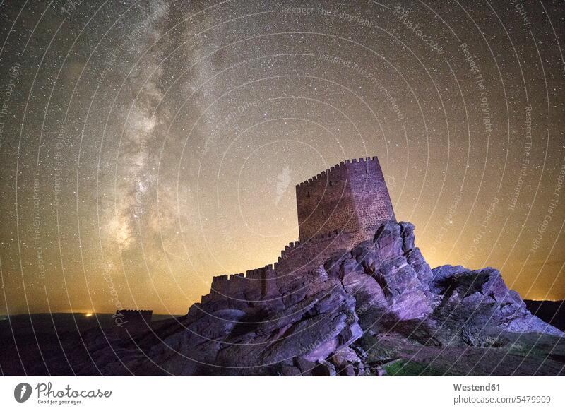 Spain, Guadalajara, Castle of Zafra at night, starry sky imaginary world fantasy castle castles fortress historical mysterious mystical enchanted illuminated