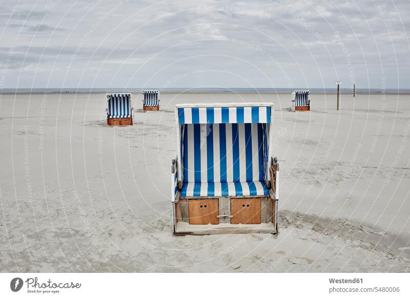 Germany, Schleswig-Holstein, St Peter-Ording, hooded beach chair roofed wicker beach chair Hooded Beach Chairs beach chairs beaches empty emptiness North Sea