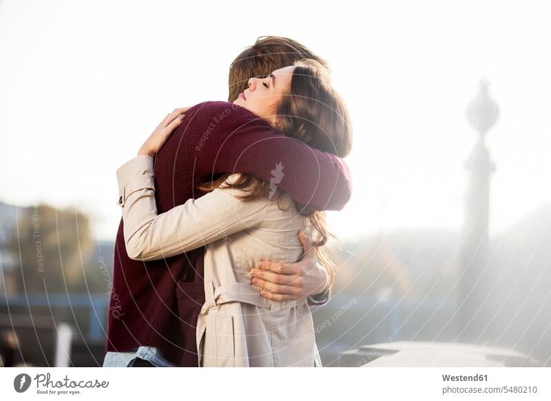 Germany, Berlin, young couple hugging caucasian caucasian ethnicity caucasian appearance european Travel togetherness bonding two people 2 2 persons 2 people