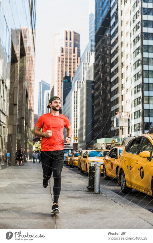 USA, New York City, man running in Manhattan men males Jogging Adults grown-ups grownups adult people persons human being humans human beings New York State
