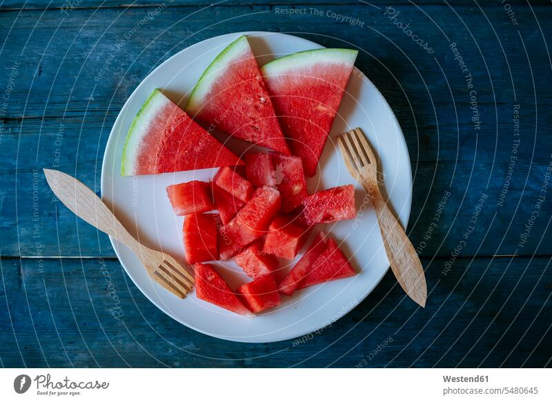Plate of watermelon, cut on blue wood Watermelon Watermelons Water Melon Water Melons white healthy eating nutrition dish dishes Plates wooden Refreshment