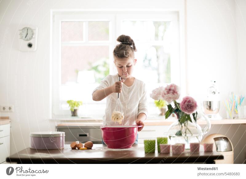 Little girl baking in the kitchen bake females girls child children kid kids people persons human being humans human beings standing dough preparing