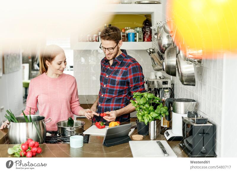 Happy young couple with tablet cooking together in kitchen happiness happy digitizer Tablet Computer Tablet PC Tablet Computers iPad Digital Tablet