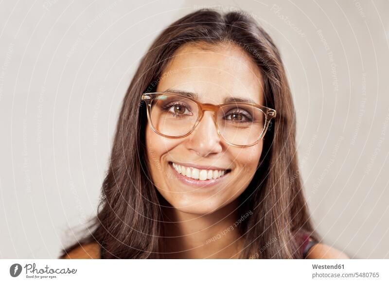 Portrait of smiling woman with glasses portrait portraits smile specs Eye Glasses spectacles Eyeglasses females women Adults grown-ups grownups adult people