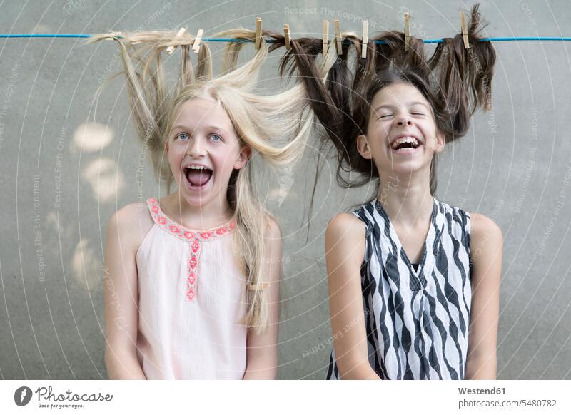 Girls hair drying on clothesline portrait portraits girl females girls child children kid kids people persons human being humans human beings Clothesline