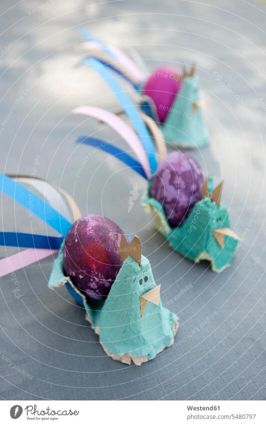Easter decoration with dyed eggs and self-made egg cups Easter nest Easter basket Easter Baskets purple DIY do-it-yourself eggcup egg cup holder egg-cup
