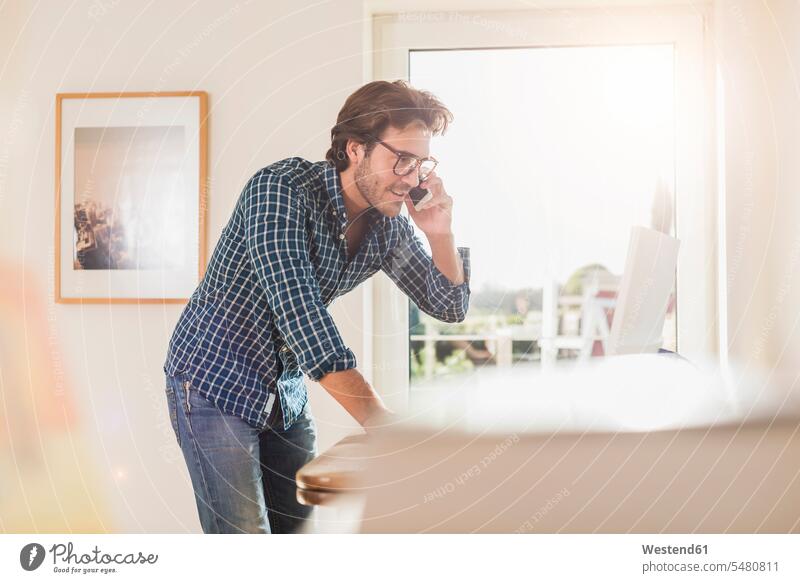 Young man working at home office caucasian caucasian ethnicity caucasian appearance european Connection connected Connections connectivity glasses specs