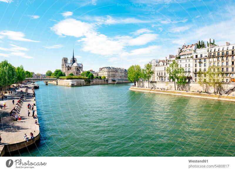 France, Paris, Seine River and Notre-Dame cloud clouds Architecture city cities metropolis Incidental people People In The Background background person