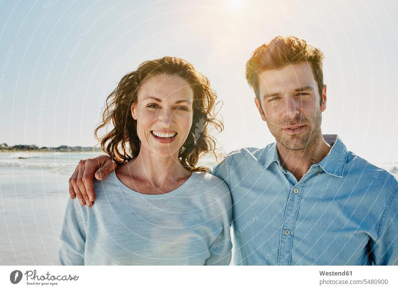 Portrait of couple on the beach beaches portrait portraits twosomes partnership couples people persons human being humans human beings Sea ocean smiling smile