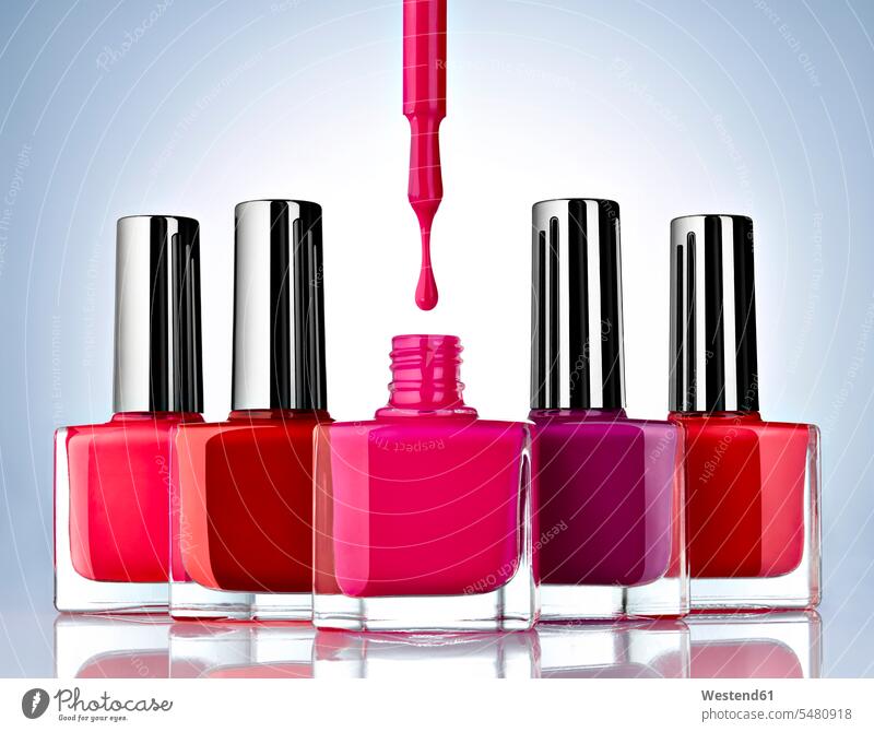 Nail Polish On Pink Background Stock Photo, Picture and Royalty Free Image.  Image 10472112.
